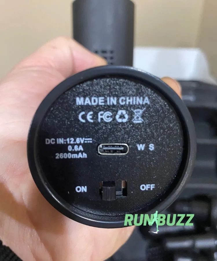 power switch and USB charging port are on the bottom of the handle